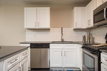 Espresso/white shaker cabinets*